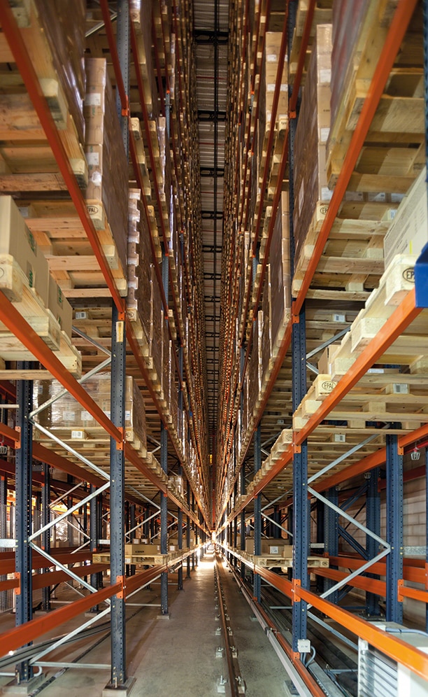 The racking is fourteen levels high with a triple-pallet storage depth each