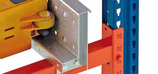 The rails are located inside the storage channels of the Automated Pallet Shuttle system