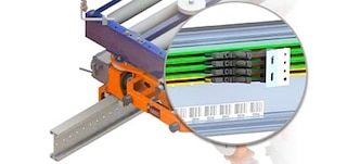 Floor-mounted rails are secured to the warehouse floor Floor-mounted rails are secured to the warehouse floor