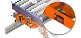 Photocells enhance system safety by ensuring the appropriate distance between trolleys Photocells enhance system safety by ensuring the appropriate distance between trolleys