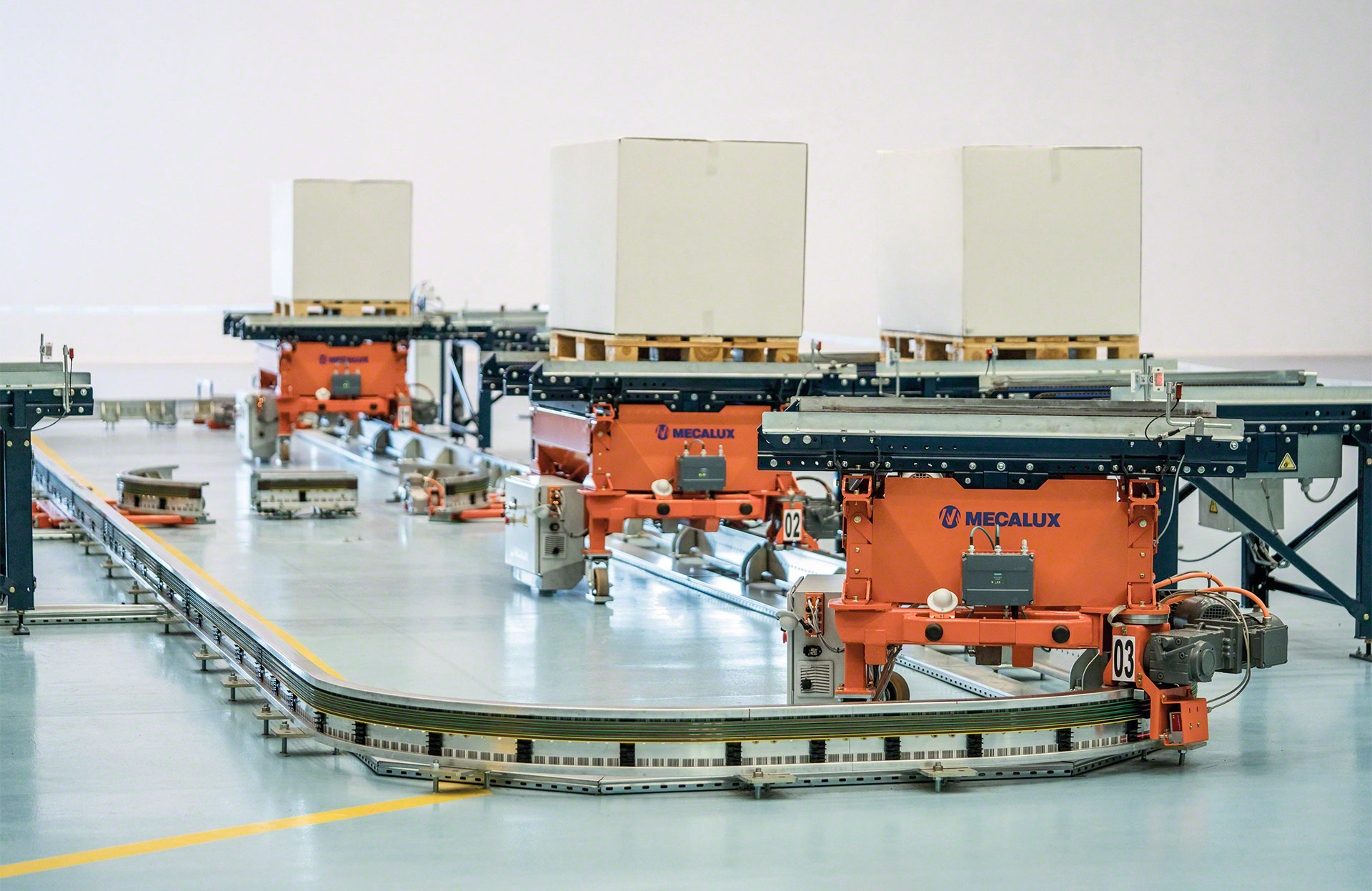 The electrified monorail system automates the internal flow of pallets