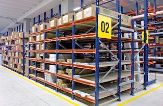 Continuous chipboard shelves create deep levels for housing long and bulky loads Continuous chipboard shelves create deep levels for housing long and bulky loads