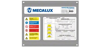 The safe load warning notice contains technical information on the push-back racking