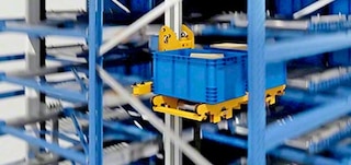 Box lifts move unit loads to the appropriate storage level