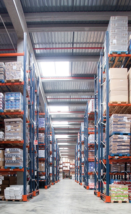 Picking tasks take place on the lower level of the racks and reserve pallets are deposited on the upper level