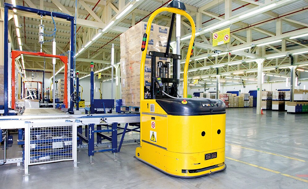 Laser guided forklifts (LGV) handle pallets leaving the warehouse