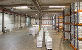 The warehouse has two distinct areas composed of drive-in and conventional pallet racking systems